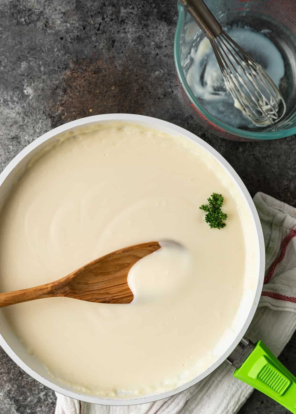 Creamy béchamel white sauce in a saucepan