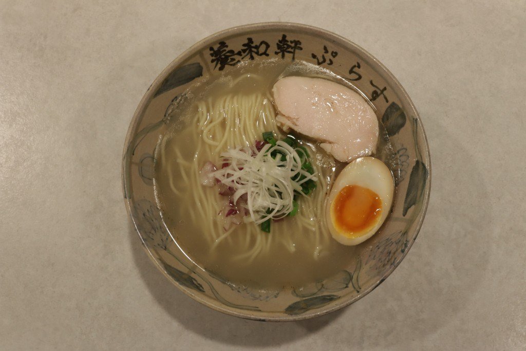 Chicken ramen bowl with jammy egg and scallions