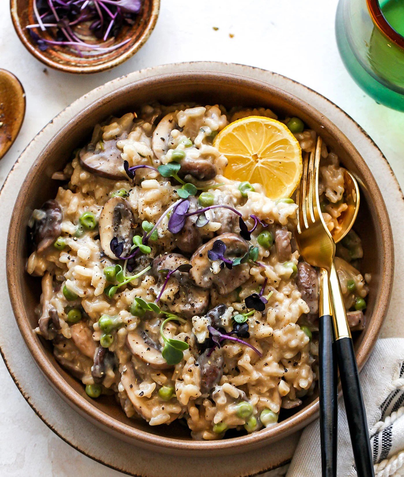 Creamy mushroom risotto in a bowl with parmesan